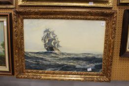 A Galleon at Sea colour print in a decorative gilt frame.