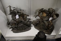 A pair of cast spelter figures of huntsmen on horseback (AF).