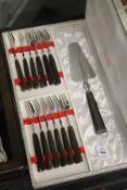 A horn handled cased cutlery set.