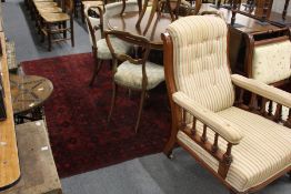 A red ground Afghan carpet.