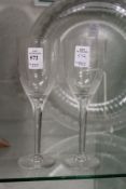 A pair of Lalique wine glasses.