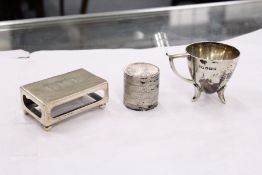 A silver matchbox case, Birmingham 1899, a coin box and a small cup.