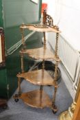 A Victorian walnut four tier corner what-not.