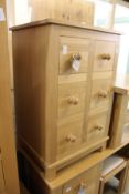 A good modern light oak small six drawer chest.