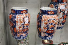 A pair of Japanese Imari ribbed vases.