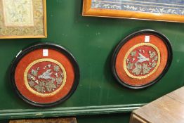 A pair of circular bead work pictures.