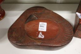 A Chinese inkstone of carved goose form.