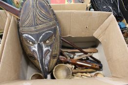 A carved wood African mask etc.