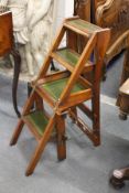 A Victorian walnut metamorphic library chair / steps.