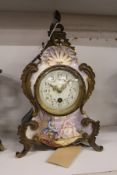 A French porcelain and ormolu mounted mantle clock.