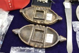 A pair of unusual carved stone dishes.