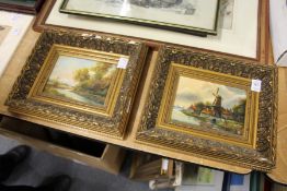 A small pair of gilt framed oil paintings.