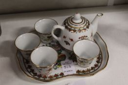 A miniature porcelain tea service.