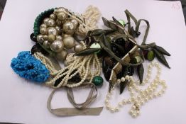 A box of costume jewellery.