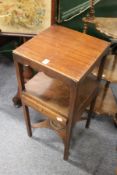 A mahogany two tier single drawer wash stand.