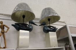 A pair of unusual decorative duck lamps.