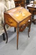 A 19th century French kingwood and marquetry inlaid bureau de dame with ormolu mounts.