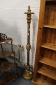 A decorative giltwood standard lamp.