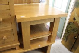 A good modern light oak two tier coffee table.