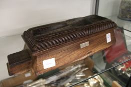 An unusual carved wood mould.