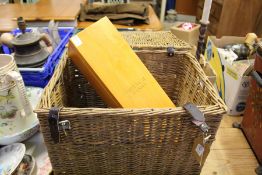 A wicker basket and a wooden box.