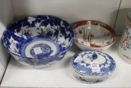 A Chinese blue and white porcelain box and cover and two bowls.