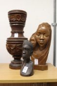 Carved wood figures and a similar vase.
