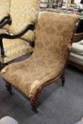 A Victorian rosewood framed bedroom chair.