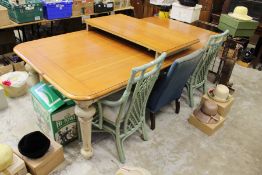 A good large varnished and painted pine kitchen table with leaf.
