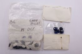 A quantity of blue sapphire stones.