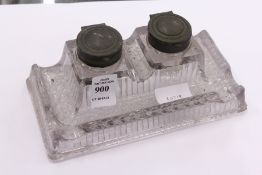 A moulded glass inkstand.