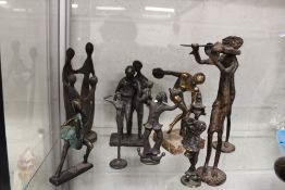 A small group of bronze and metal figures of musicians etc.