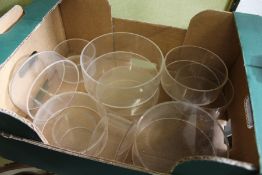 A box of perspex stands.