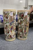 A pair of Chinese porcelain cylindrical vases.