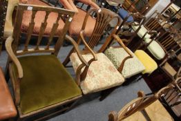 19th century yew wood armchair and three other chairs.