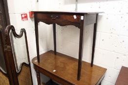 A George III mahogany single drawer side table.