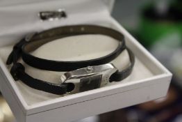 A ladies' Gucci wristwatch.