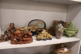 A Chinese carved soapstone figure groups and other items.