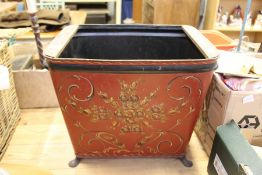 A decorative Toleware storage bin.