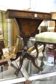 A 19th century mahogany work table.