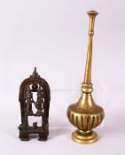 AN INDIAN BRASS ROSEWATER SPRINKLER, together with a cast brass figure group, 27cm and 15cm.