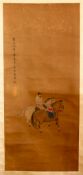 A CHINESE PAINTED TEXTILE SCROLL OF A WARRIOR UPON HORSEBACK, the warrior upon his horse with