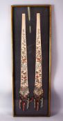 A PAIR OF 19TH CHINESE FRAMED EMBROIDERED SILK HANGINGS, embroidered with scenes of figures,