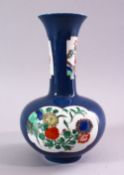 A 19TH / 20TH CENTURY CHINESE POWDER BLUE / FAMILLE VERTE PORCELAIN VASE, with panels of bouquet