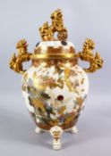 A LARGE JAPANESE MEIJI PERIOD SATSUMA MORIAGE CERAMIC KORO & COVER, the body with twin moulded Shi -