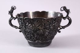 A JAPANESE MEIJI PERIOD SOILID SILVER DRAGON & CHRYSANTHEMUM PRESENTATION BOWL, the body of the