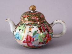 A SMALLER 19TH CENTURY CHINESE CANTON FAMILLE ROSE PORCELAIN TEAPOT AND COVER, decorated with