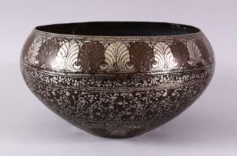 A 19TH / 20TH CENTURY INDIAN INLAID BOWL, the body of the bowl with floral white metal inlaid