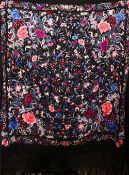 A 20TH CENTURY CHINESE EMBROIDERED BLACK SILK PIANO SHAWL / TEXTILE, with floral embroidery and