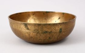 A PERSIAN ENGRAVED BRASS CALLIGRAPHIC BOWL, carved with calligraphy and animals, 18cm.